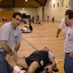 Charschan Chiropractic & Sports Injury Associates - Dr. Charschan working USATF Track meet