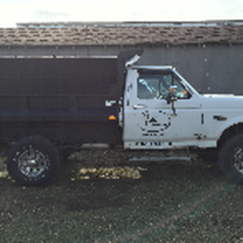 Prox Lawn Care - a dump truck parked in front of a barn - Snow Removal Near Me - Terre Haute, Indiana Prox Lawn Care - a dump truck parked in front of a barn - Snow Removal Near Me - Terre Haute, Indiana