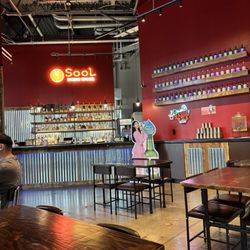 Sool Korean Kitchen - Self serve water under shelves on right