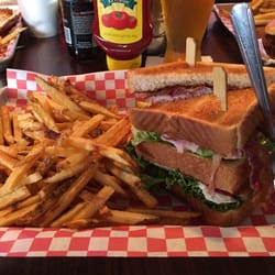 Trade Winds Pub and Eatery - Club sandwich, look at the fork, it's HUGE!!