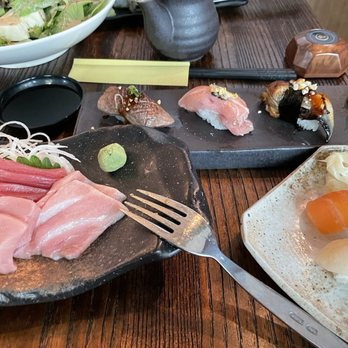 Nagomiya - Bluefin tuna sashimi front left. Scallop and salmon nigiri front right. Behind a5 wagyu nigiri, bluefin tuna nigiri and unagi nigiri. - Sushi Bars Near Me - Atlanta, Georgia Nagomiya - Bluefin tuna sashimi front left. Scallop and salmon nigiri front right. Behind a5 wagyu nigiri, bluefin tuna nigiri and unagi nigiri. - Sushi Bars Near Me - Atlanta, Georgia