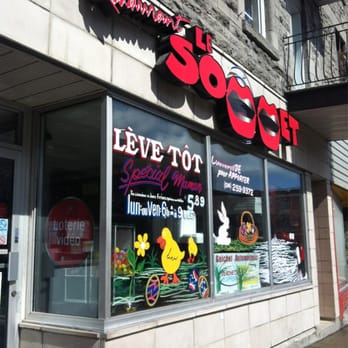 Sommet - the front of a store with a sign on the window - Delis Near Me - Montreal, Quebec Sommet - the front of a store with a sign on the window - Delis Near Me - Montreal, Quebec