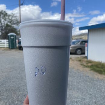 Chilcoot Frosty - a hand holding a cup with a straw - Ice Cream & Frozen Yogurt Near Me - Chilcoot, California Chilcoot Frosty - a hand holding a cup with a straw - Ice Cream & Frozen Yogurt Near Me - Chilcoot, California