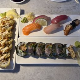 A collection of various rolls and sashimi off the happy hour menu. A collection of various rolls and sashimi off the happy hour menu.