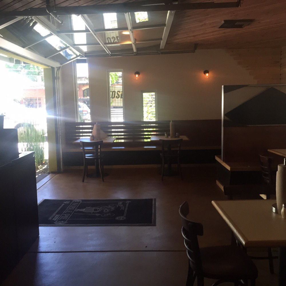 Noble Pie Parlor - Midtown - Garage door to outdoor seating that can be opened for semi outdoor seating - Chicken Wings Near Me - Reno, Nevada Noble Pie Parlor - Midtown - Garage door to outdoor seating that can be opened for semi outdoor seating - Chicken Wings Near Me - Reno, Nevada