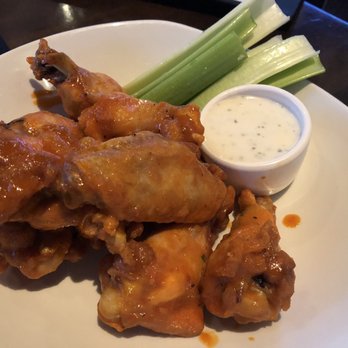 Yard House - Buffalo wings with celery and ranch - New American Near Me - Cincinnati, Ohio Yard House - Buffalo wings with celery and ranch - New American Near Me - Cincinnati, Ohio