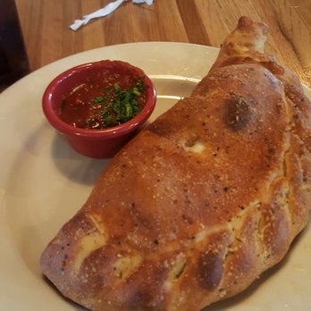 Old Chicago Pizza + Taproom - Calzone or better known as grease bomb - Pizza Near Me - Columbia, South Carolina