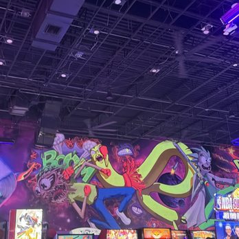 Arcade Monsters - The design on the wall is just so cool and amazing - Arcades Near Me - Orlando, Florida