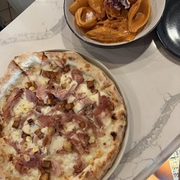 Sono pizza and large shell pasta Sono pizza and large shell pasta