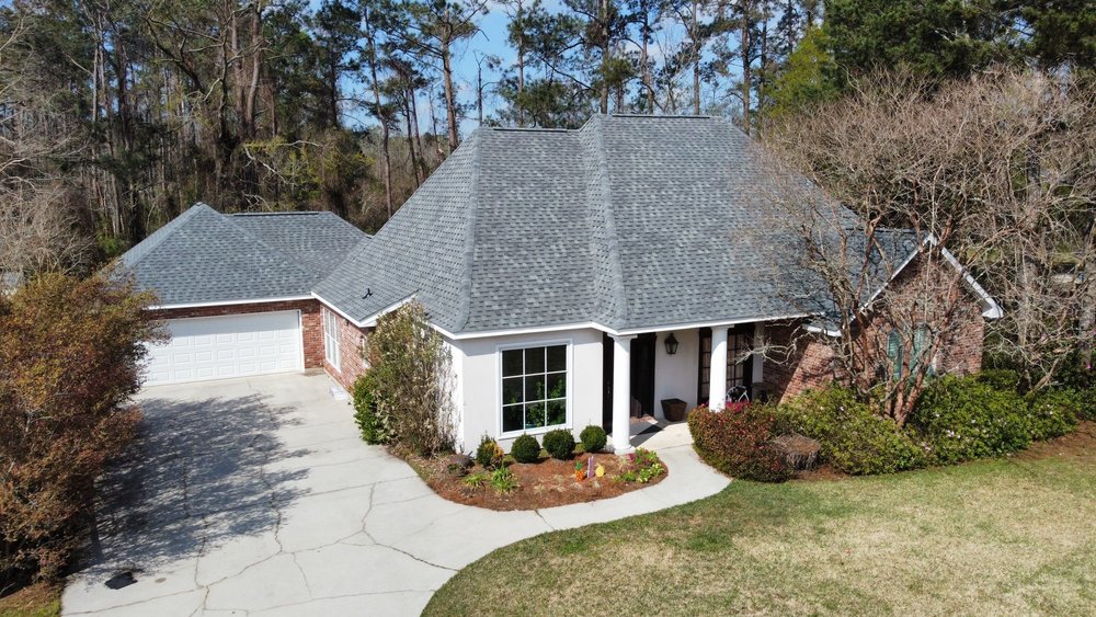Slide of Coastal Roofing