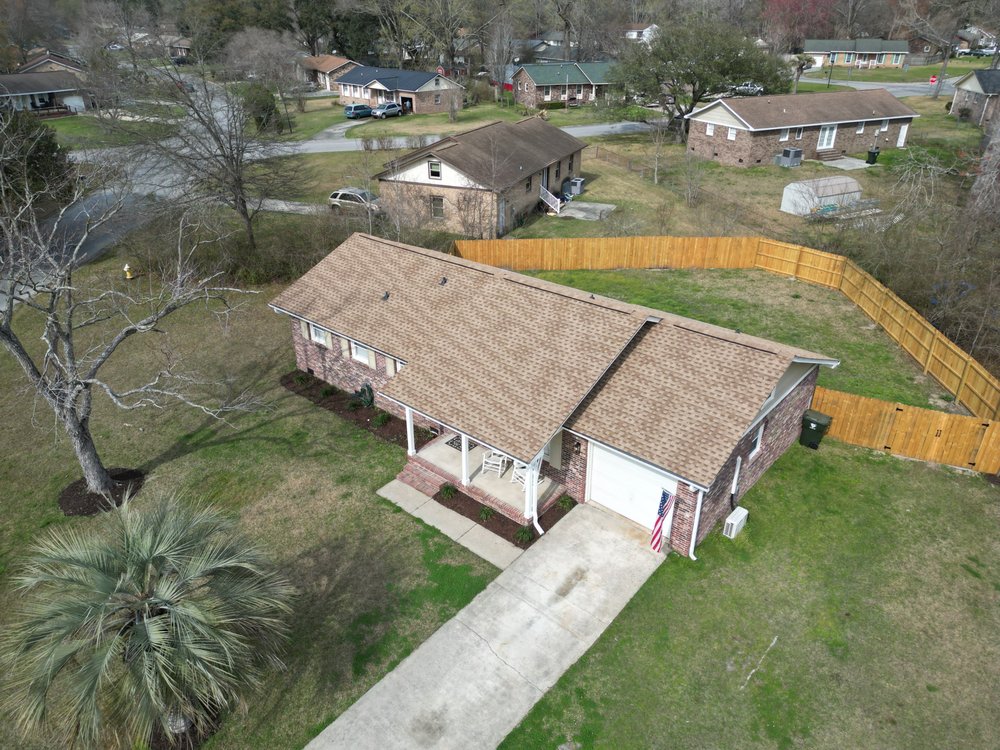 Slide of CMS Roofing