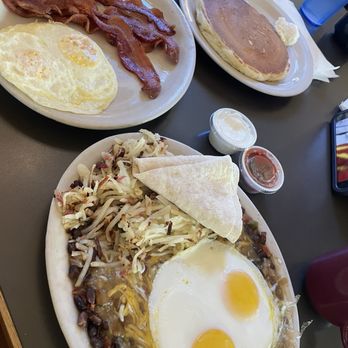 The Virginian Restaurant - Top: Dick 's Favorite and one stack of pancakes Bottom: Huevos Rancheros - American Near Me - Jackson, Wyoming The Virginian Restaurant - Top: Dick 's Favorite and one stack of pancakes Bottom: Huevos Rancheros - American Near Me - Jackson, Wyoming