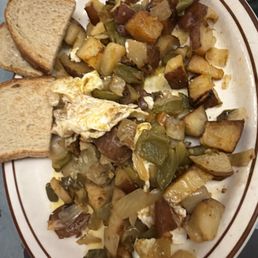 Dom's hearty hash with beef tenderloin. I'm going to take it home and add more eggs for tomorrow's breakfast. Dom's hearty hash with beef tenderloin. I'm going to take it home and add more eggs for tomorrow's breakfast.