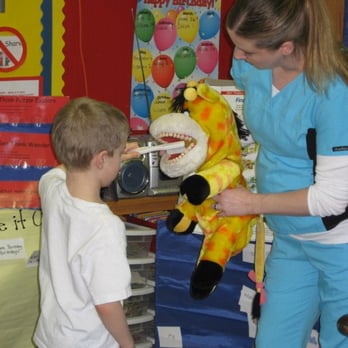 White Bear Smiles - Tammy, Dental Hygienist, at a local preschool teaching about the benefits of great brushing and flossing at an early age. - Cosmetic Dentists Near Me - White Bear Lake, Minnesota White Bear Smiles - Tammy, Dental Hygienist, at a local preschool teaching about the benefits of great brushing and flossing at an early age. - Cosmetic Dentists Near Me - White Bear Lake, Minnesota