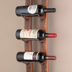 The Hopscotch Room - Cute wine rack made of old wine barrels. Love the industrial look. Thanks Hopscotch Room!
