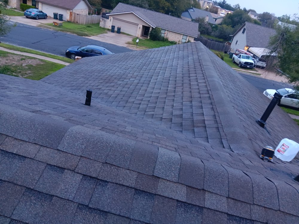 Slide of Pinedas Roofing Company