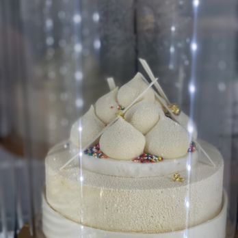 Edwards Dessert Kitchen - a cake in a display case - Desserts Near Me - Minneapolis, Minnesota
