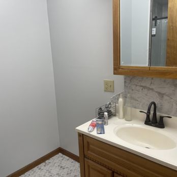 B-N-W Construction - ows a bathroom with a toilet, sink, and mirror - General Contractors Near Me - Barry, Illinois B-N-W Construction - ows a bathroom with a toilet, sink, and mirror - General Contractors Near Me - Barry, Illinois