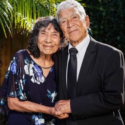 Wearing a classic suit for his 90th Birthday
