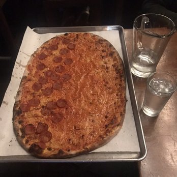 BAR - Friends LARGE pizza. Half pepperoni & half plain cheese. Check out the tray in relation to water glass for size. - Pizza Near Me - New Haven, Connecticut