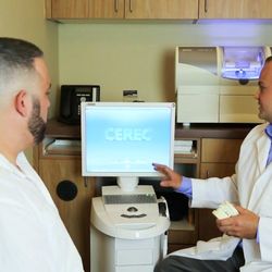Riggs Family Dental - Chandler - Dr. Carlos Lopez of Riggs Family Dental explaining CEREC same day crowns to patient