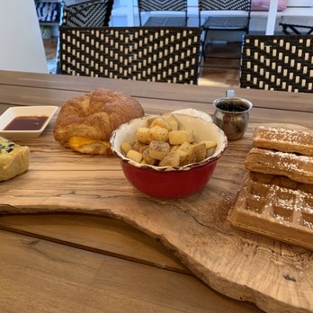 Ancient City Brunch Bar - quiche, datil pepper sauce, sausage egg and cheese croissant, home fries (amazing), Belgium waffles - Cafes Near Me - St. Augustine, Florida