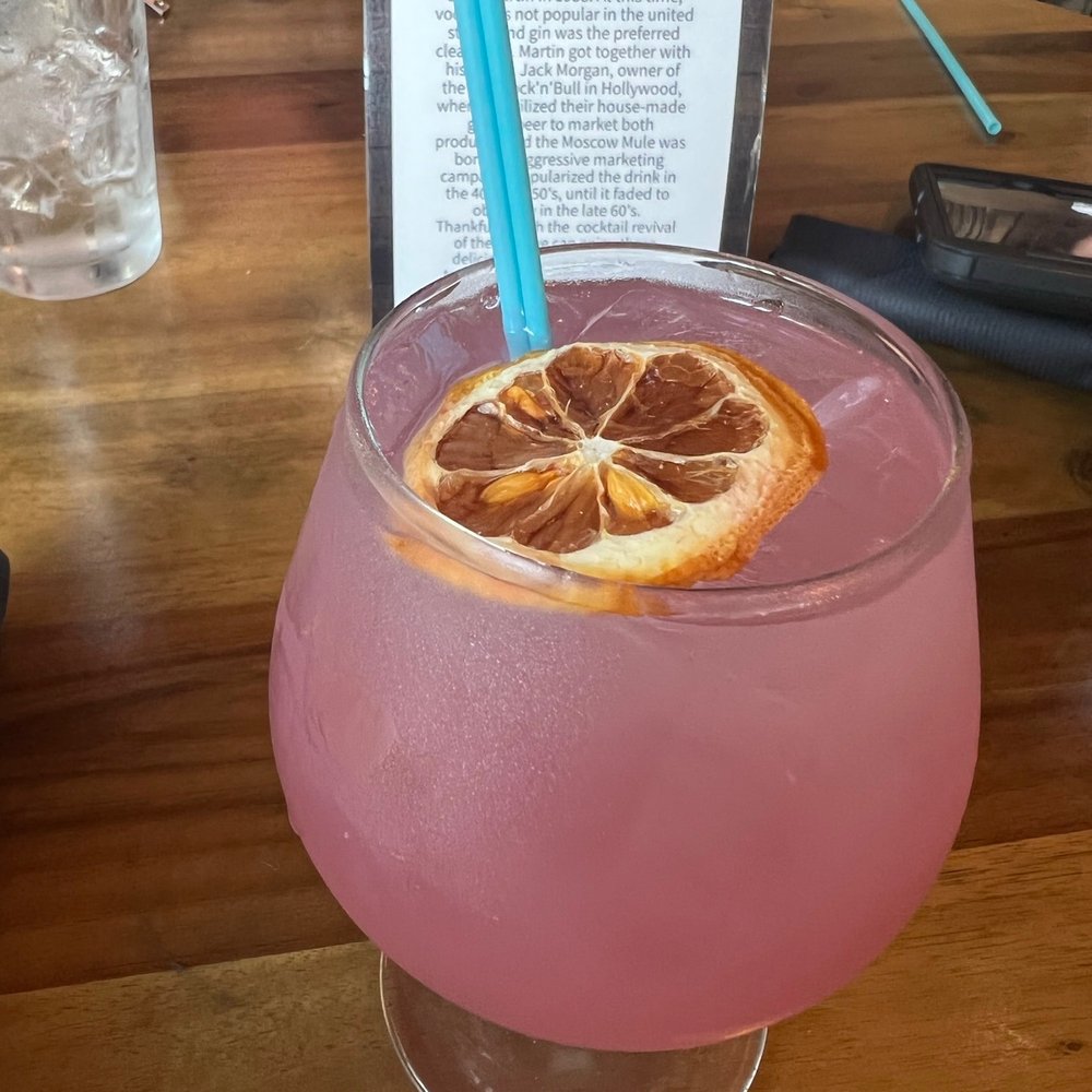 The Stubborn Mule - The Artist Formerly Known as Purple Rain. Rhubarb Gin cocktail. - New American Near Me - Orlando, Florida The Stubborn Mule - The Artist Formerly Known as Purple Rain. Rhubarb Gin cocktail. - New American Near Me - Orlando, Florida