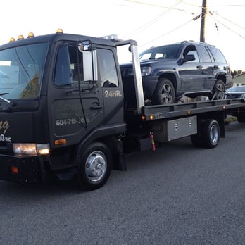 Sterling Auto Towing Plus - flat deck tow 2 cars in one load - Towing Near Me - Burnaby, British Columbia