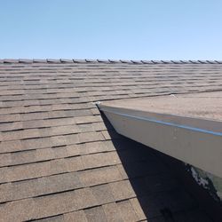 T J Roofing