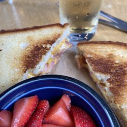 Bedford Food & Drink - Grilled ham and cheese sandwich with fruit on the side and ginger ale.