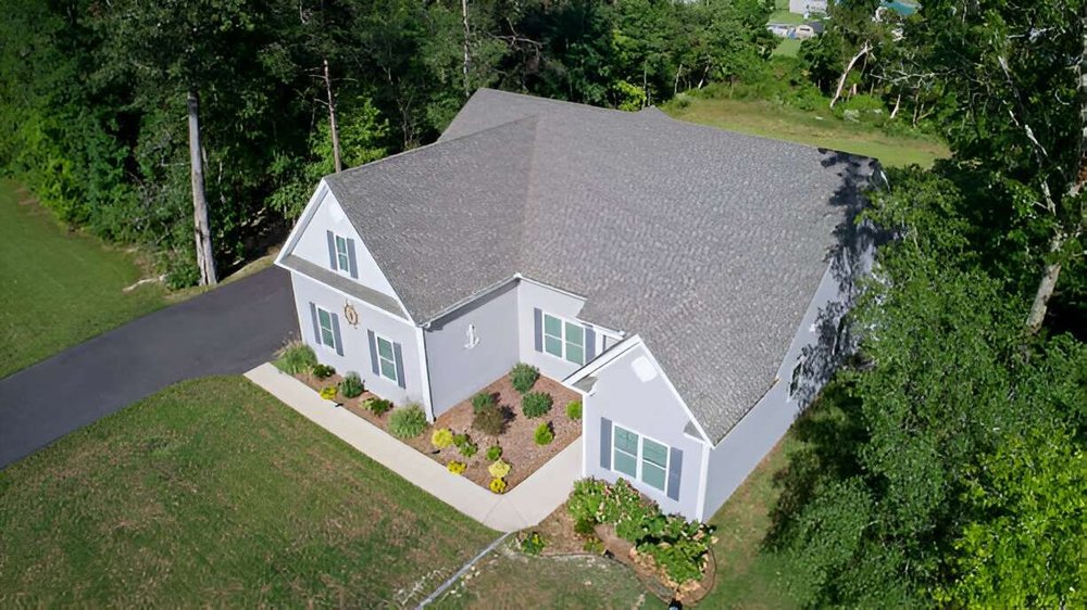 Slide of Rooftek Roofing