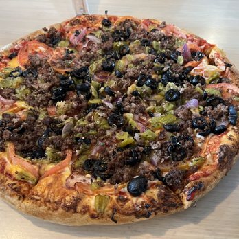 Village Pizza - Mexican Pizza - tomatoes, green chiles, olives, ground beef & onions - Pizza Near Me - Albuquerque, New Mexico