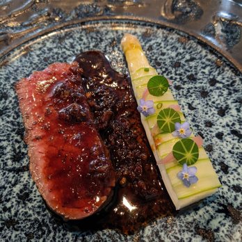 Aubergine - Omaha Ribeye with abalone and wagyu XO sauce. White asparagus with forget-me-nots. - New American Near Me - Carmel, California
