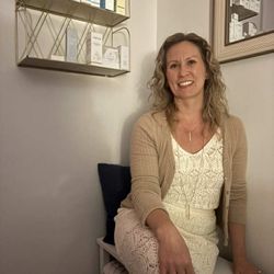 Owner, Nicole, in the treatment suite.