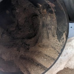 Angelo's Chimney & Stove Service - Soot backed up into the chimney after we removed the chimney from the stove. This is the bottom by the elbow joint.