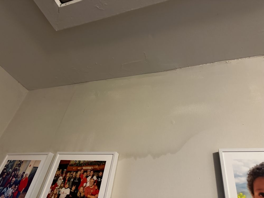 Slide of Gulliver Roofing