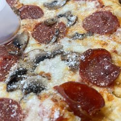 Pizza Stop, Greece - Pepperoni and mushroom pizza