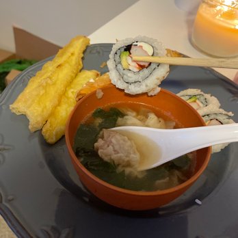 Wassabi - a bowl of soup with a spoon and corn on the side - Asian Fusion Near Me - Hillsboro, Oregon Wassabi - a bowl of soup with a spoon and corn on the side - Asian Fusion Near Me - Hillsboro, Oregon