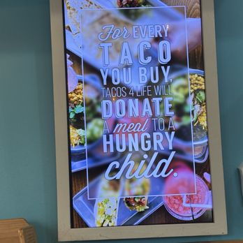 Tacos 4 Life - Another slide on their screen that tells about their mission to help hungry kids. - Mexican Near Me - Tulsa, Oklahoma