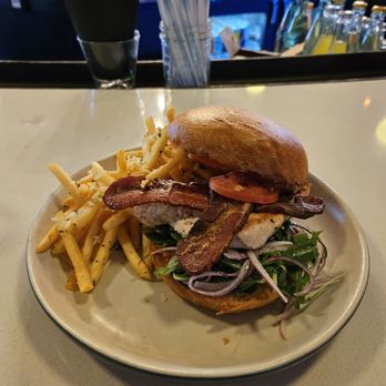 Punch Bowl Social - Grilled chicken sandwich with Rosemary fries - Gastropubs Near Me - Denver, Colorado Punch Bowl Social - Grilled chicken sandwich with Rosemary fries - Gastropubs Near Me - Denver, Colorado