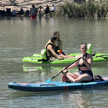 Parkview Riverside RV Park - Paddle boarding with the dog - RV Parks Near Me - Concan, Texas
