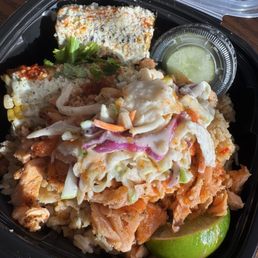 Delicious Pequot bowl- hot honey salmon, berry slaw, rice, street corn, and my favorite kind of pickles.