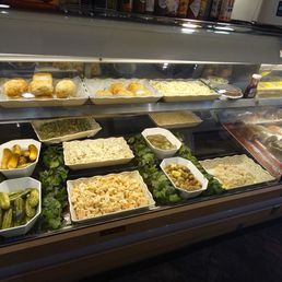 Deli in the cases with all the takeout including knishes and potato pancakes. Deli in the cases with all the takeout including knishes and potato pancakes.