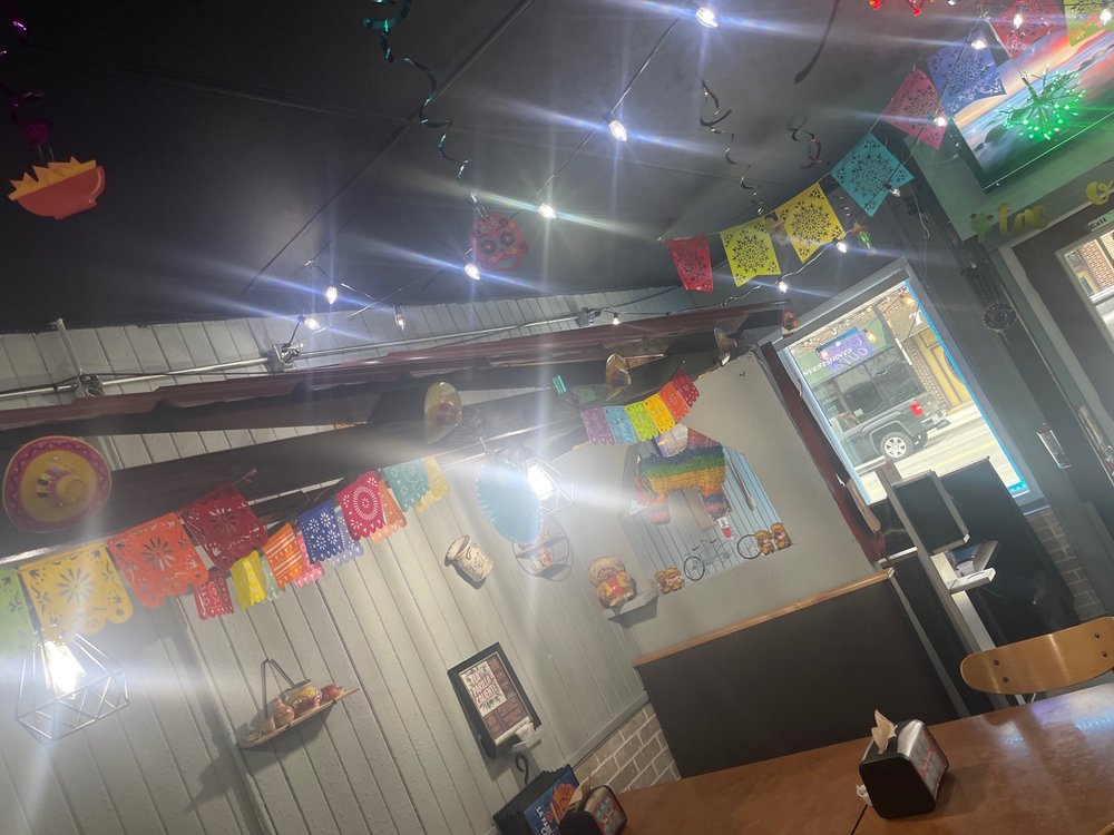 La Parilla Caliente Logo