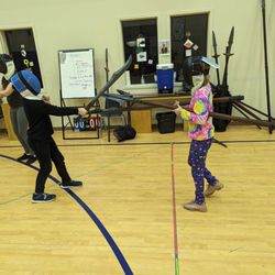 Swords of Chivalry - A boy fights a girl