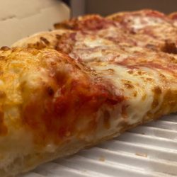Porky's Pizza - We love Porky's!! Pizza is tender and so are their garlic knots