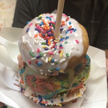 Donutz On A Stick - Rainbow sprinkle glaze with Superman ice cream. - Desserts Near Me - Duck, North Carolina
