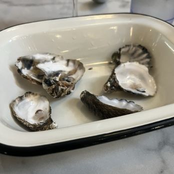 The Dive Oyster Bar - Empty oyster shells. It was Kumamoto, shigoku and Misty Point. - Cajun/Creole Near Me - Yorba Linda, California The Dive Oyster Bar - Empty oyster shells. It was Kumamoto, shigoku and Misty Point. - Cajun/Creole Near Me - Yorba Linda, California