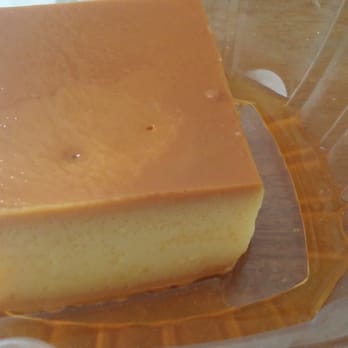 Delicias Ambatenas - a piece of cheesecake in a plastic container - Cafes Near Me - Jackson Heights, New York Delicias Ambatenas - a piece of cheesecake in a plastic container - Cafes Near Me - Jackson Heights, New York
