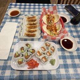 Chicken Gyoza, Take a Bao, Salmon Avocado roll & Spicy Crab Roll Chicken Gyoza, Take a Bao, Salmon Avocado roll & Spicy Crab Roll